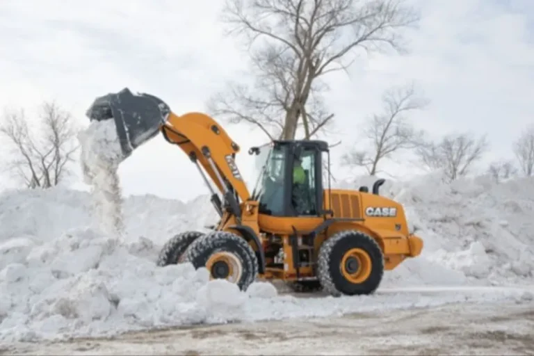 A vehicle being used to remove snow after a large snow storm